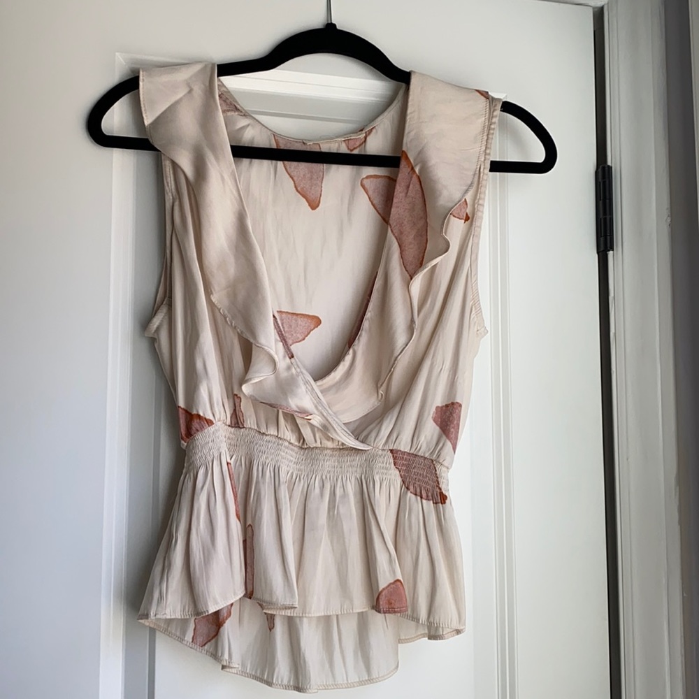 Pink printed peplum blouse